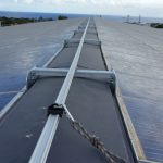 VERTIC's ALTIRAIL horizontal fall protection rail system on ALBIOMA's photovoltaic panels